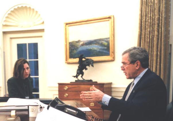 Colleen Carroll Campbell working with President George W. Bush in the Oval Office, 2003 (photo by White House Photo Office)